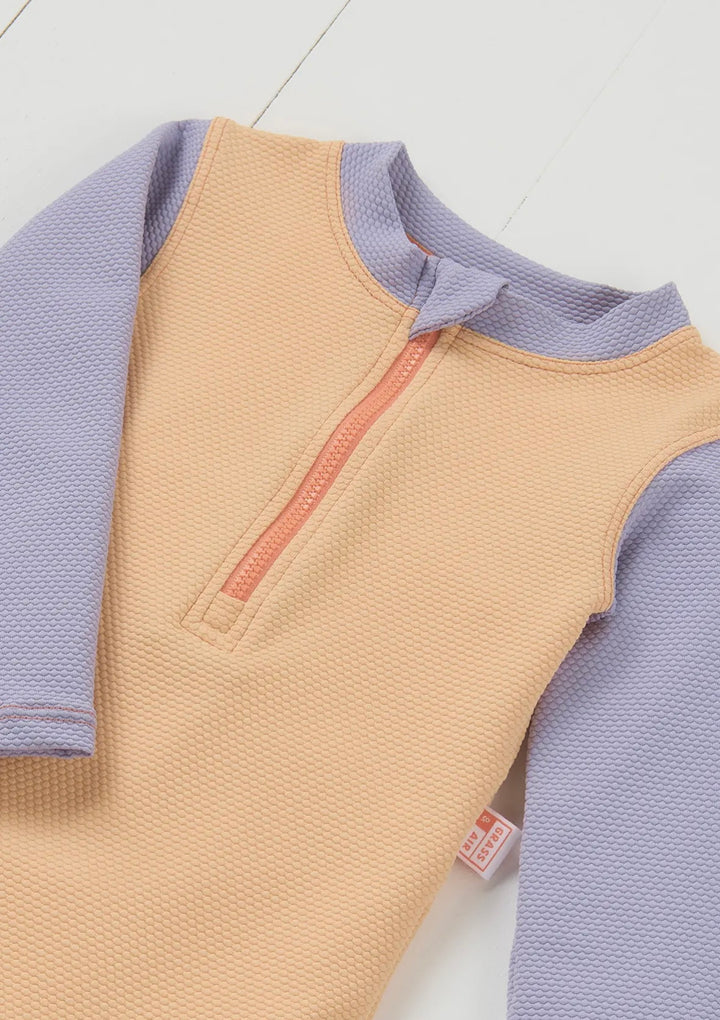 Peach Ribbed long sleeved swimsuit