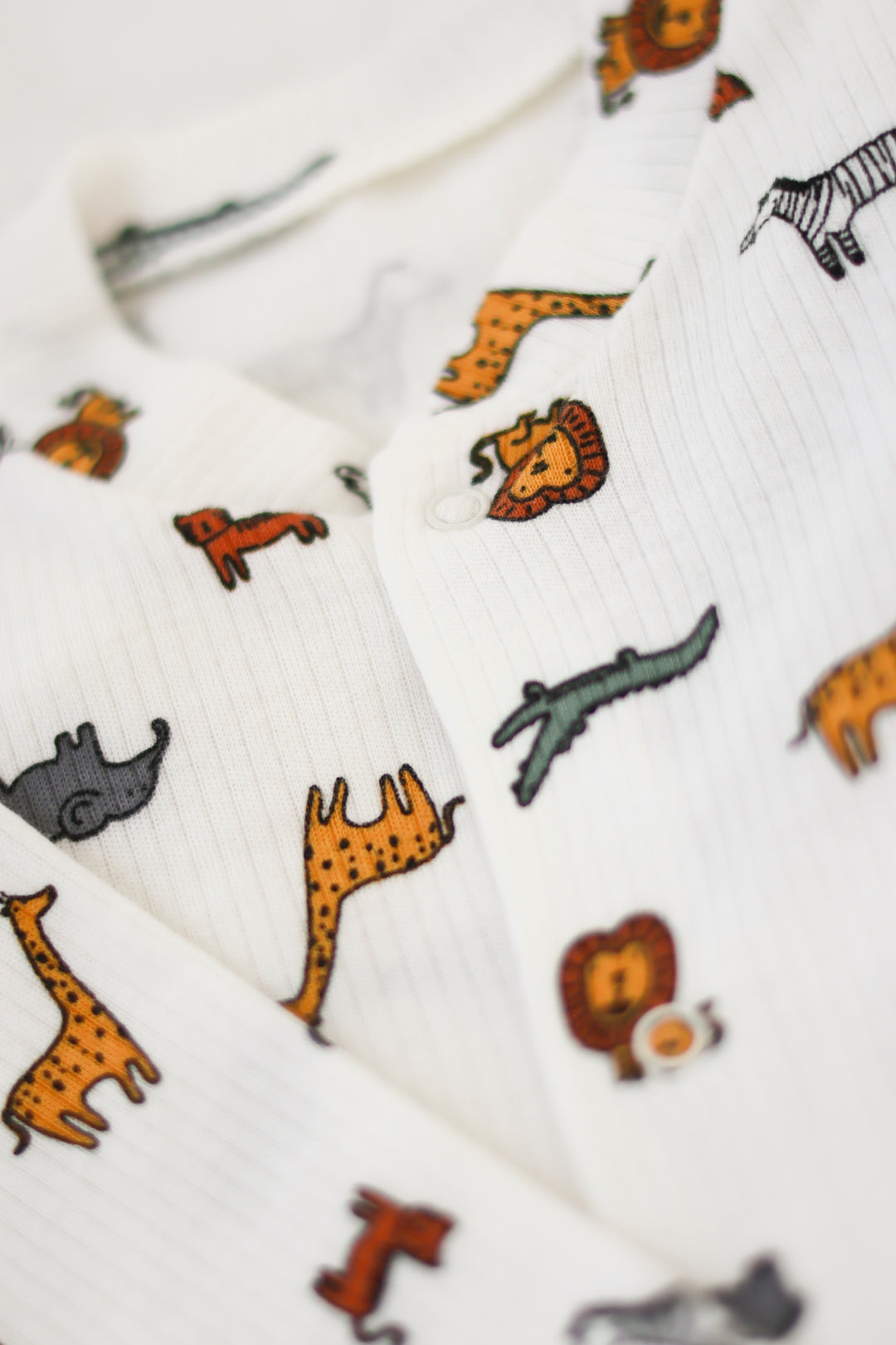 100% Cotton Animal Print baby grow